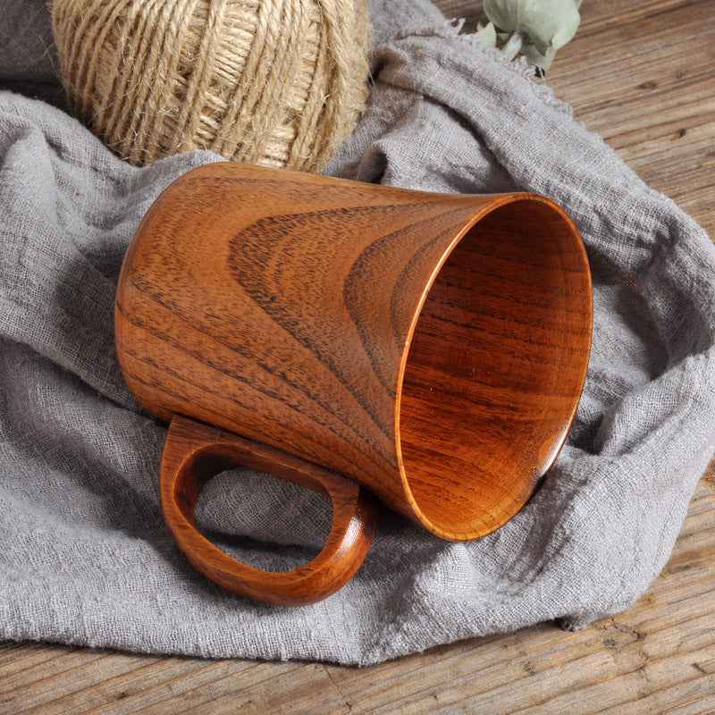 Eco-friendly wooden mug for rustic morning coffee or Japanese tea ceremony
