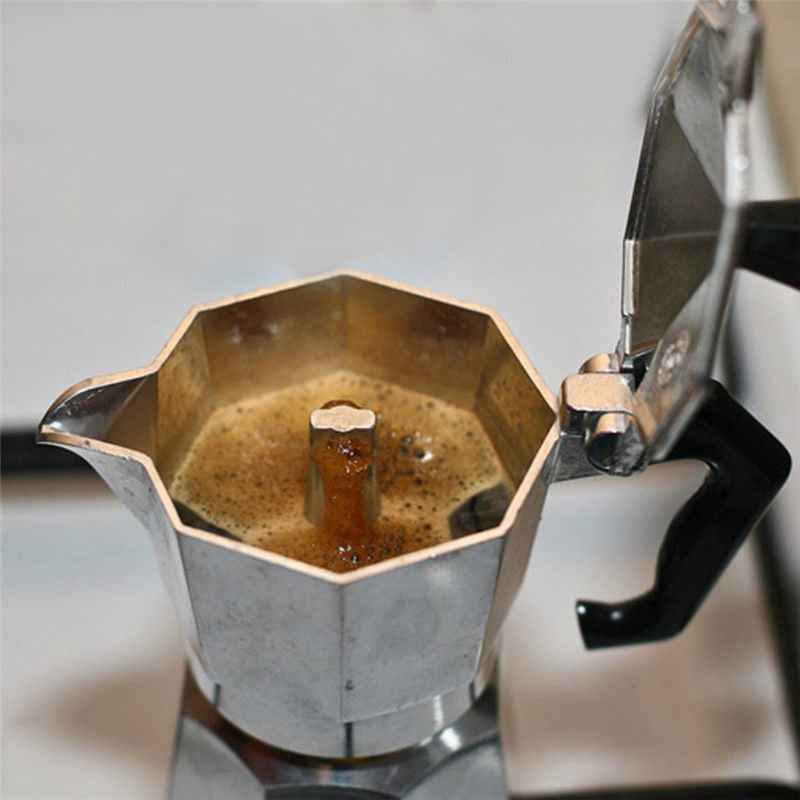 Brewing traditional coffee in anise octagonal pot - Create authentic cafe experience at home