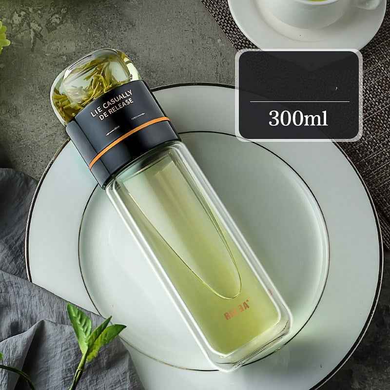 Fruit infused water in glass tumbler with straw, ideal for healthy hydration throughout the day