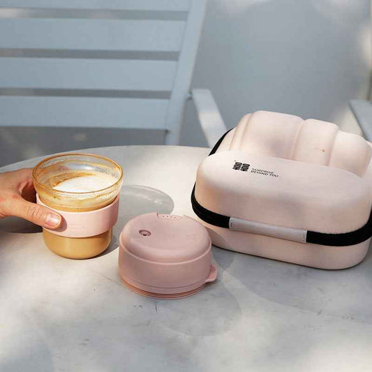 Everything included in the pour over coffee set: dripper, kettle, filters, scoop, and carafe