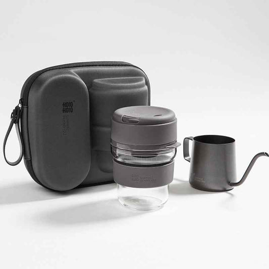 Complete pour over coffee starter kit with ceramic dripper, gooseneck kettle, filters, and scoop