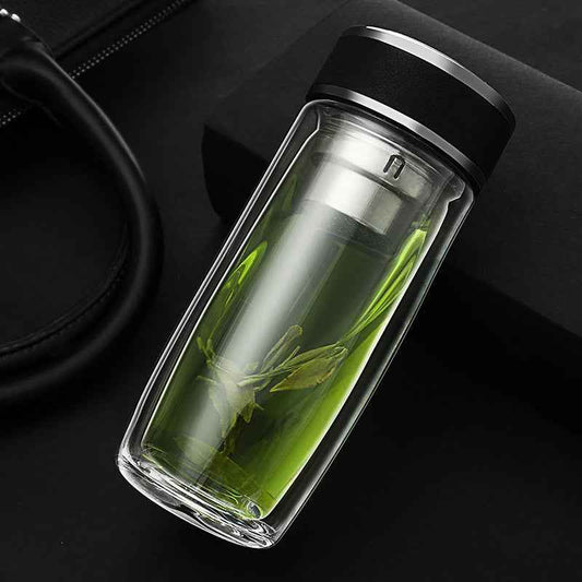 Double wall glass tumbler with clear insulation, keeps drinks cold without condensation