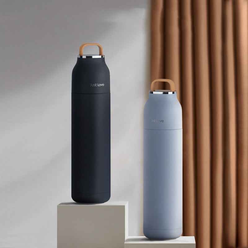 Double wall insulated glass tumbler keeps drinks cold without condensation, hot without burning hands