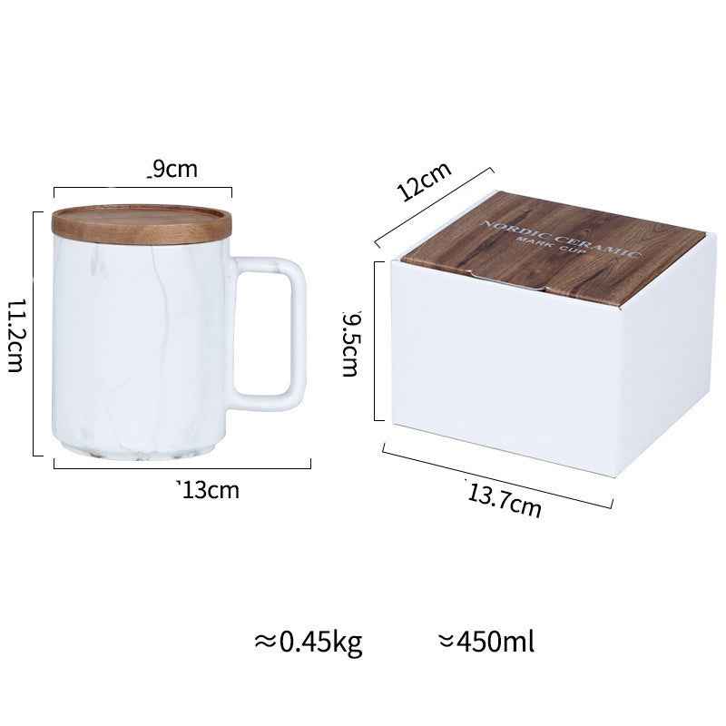 Marble coffee mug on a minimalist desk with laptop, perfect for home office or modern kitchen