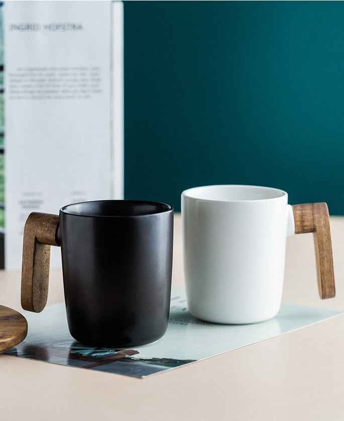 “Buy artisanal ceramic coffee mug – handcrafted acacia wood handle cup for tea and coffee”