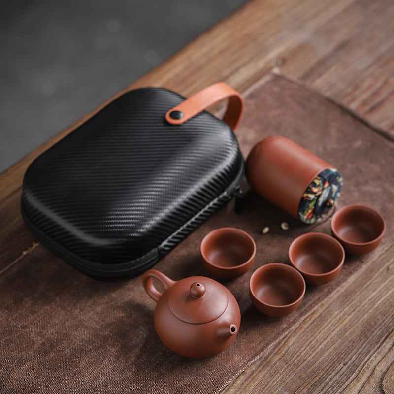 “Premium Yixing clay teapot and cups – handcrafted portable tea set for traditional Chinese tea ceremony”