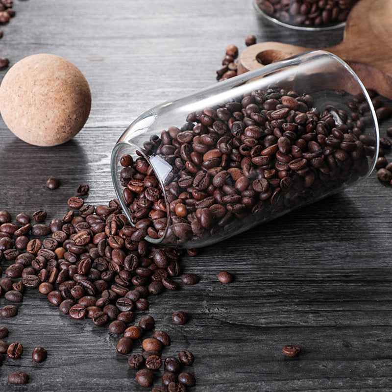 Borosilicate glass coffee pot with hot coffee, demonstrating heat resistance and clarity