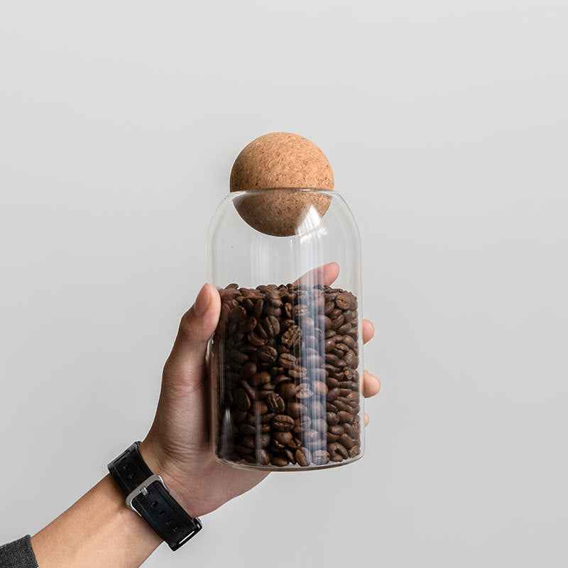 Ergonomic pour spout on heat-resistant glass carafe for controlled, drip-free serving