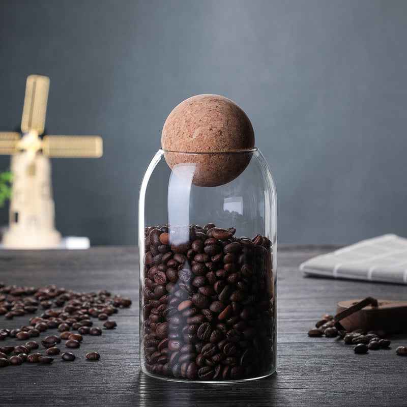Heat-resistant handle on glass coffee pot for safe and comfortable gripping