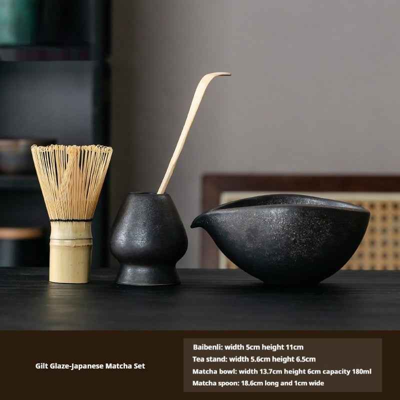 Complete Japanese matcha tea set with ceramic bowl, bamboo whisk, scoop, and sieve for traditional preparation