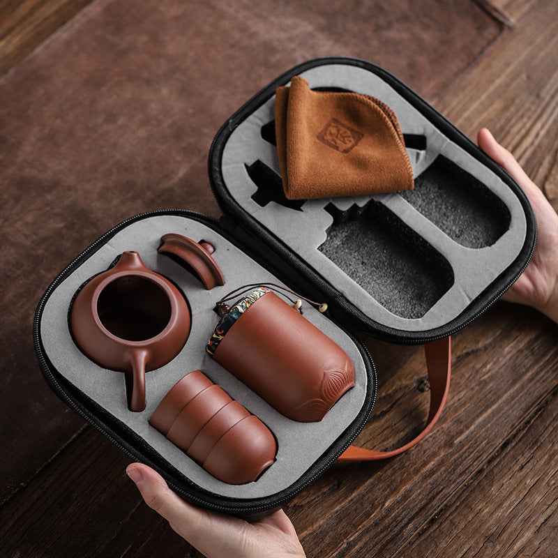 “Buy travel tea set – portable Yixing purple clay 10-piece tea set with elegant carrying case”