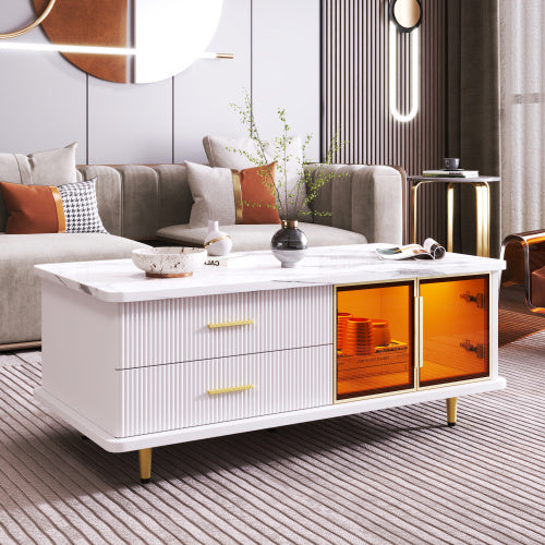Modern white coffee table with marble top and hidden LED storage compartments