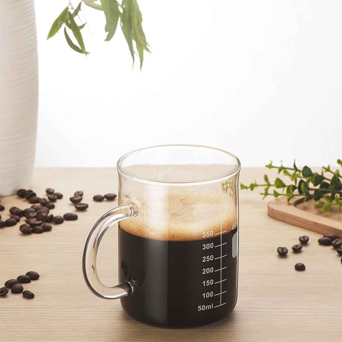 “Clear glass measuring cup with handle and spout – accurate liquid measuring jug for home chefs”