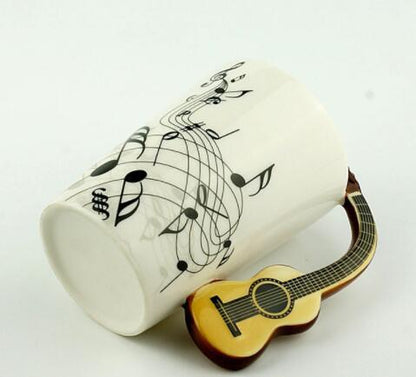 Music lover's ceramic mug - creative guitar and violin themed drinkware