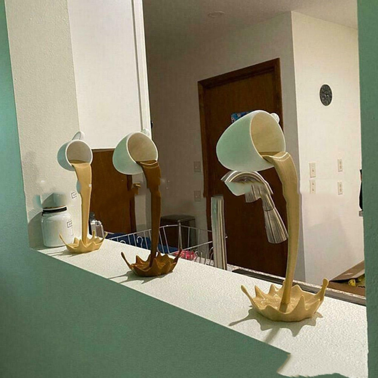 Floating coffee cup decoration hanging on Christmas tree with lights, perfect for coffee lovers