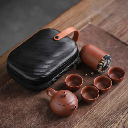 “Premium Yixing clay teapot and cups – handcrafted portable tea set for traditional Chinese tea ceremony”